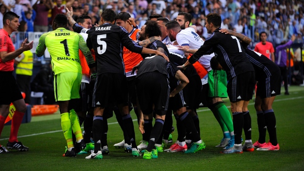 Soccer roundup: Real Madrid wins to secure La Liga crown