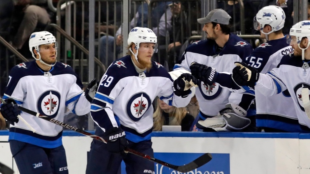 Scheifele's hat trick lifts Jets past Wild