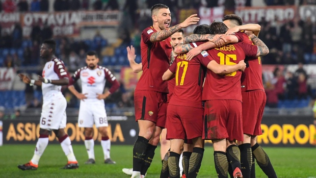 Roma players celebrate