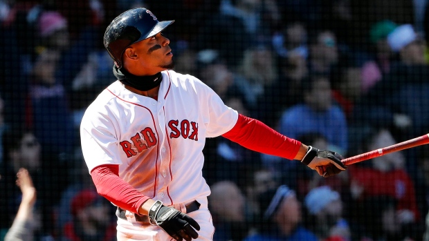 Xander Bogaerts of the Boston Red Sox runs toward first base he