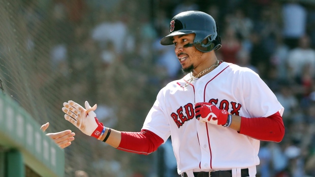 Mookie Betts homers 3 times to lift Red Sox over Royals