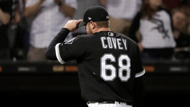 Chicago White Sox starting pitcher Dylan Covey delivers during the