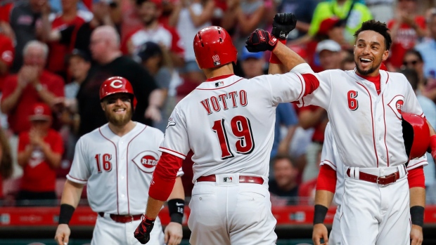 Reds get grand slam from Eugenio Suarez, back Tyler Mahle to