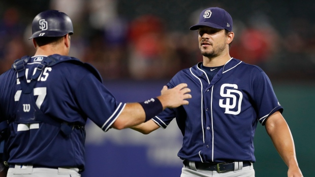 Padres trade Brad Hand and Adam Cimber to Cleveland Indians for