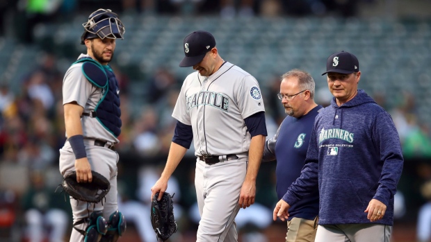 Felix hit by liner in pitching arm; X-ray negative