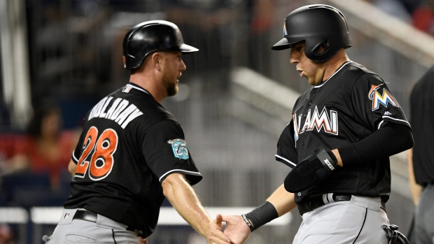 Mets capitalize on Marlins' extra-inning error in walk-off win