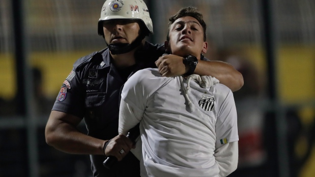 Copa Libertadores match marred by fan violence - TSN.ca