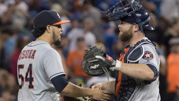 Toronto Blue Jays Lourdes Gurriel Jr. and his brother Houston Astros Yuli  Gurriel just prior to the start of their American League MLB baseball game  in Toronto on Monday September 24, 2018.