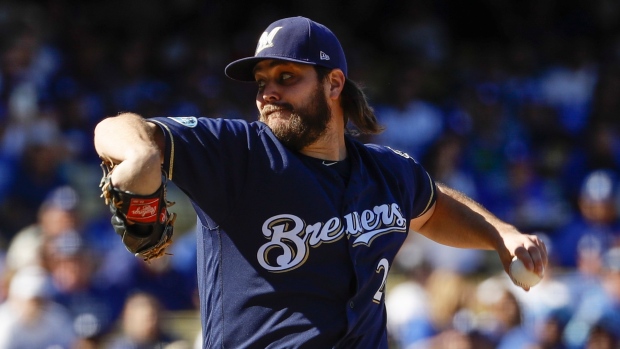 Wade Miley pulled after one batter as Brewers manager Craig