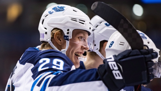 Adam Lowry, Blake Wheeler lead Jets to Game 1 win over Golden