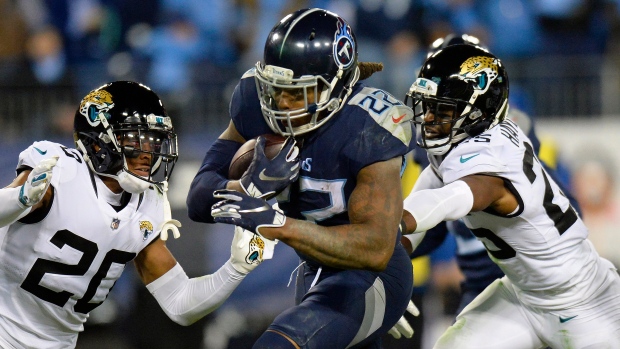 Derrick Henry runs into NFL record book as Titans rout Jaguars 30-9