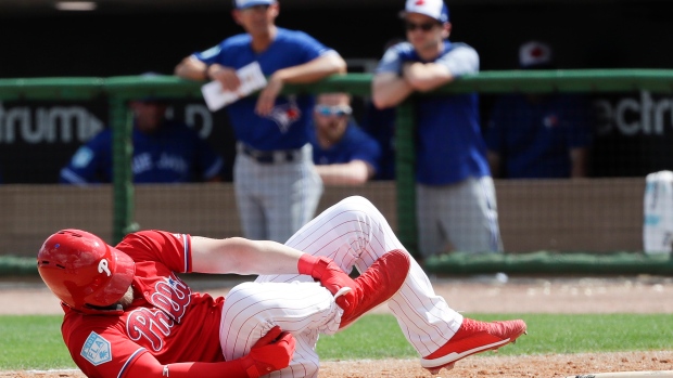 Bryce Harper leaves game after crashing into right-field wall 