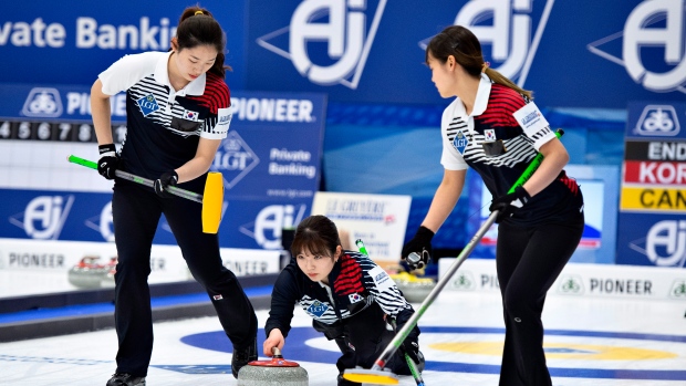 Korean players in action in their World Women's Curling Championship