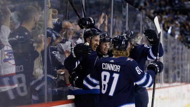 Connor s hat trick sends Jets to playoffs with win over Preds TSN.ca