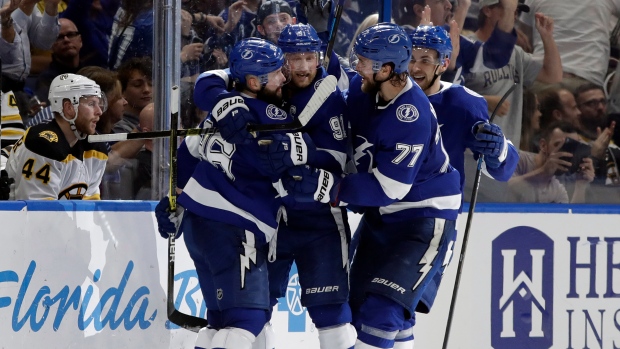 Palat scores in OT, Lightning rally past Habs in NHL return