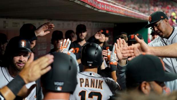 Giants overcome four-run deficit to beat Rockies