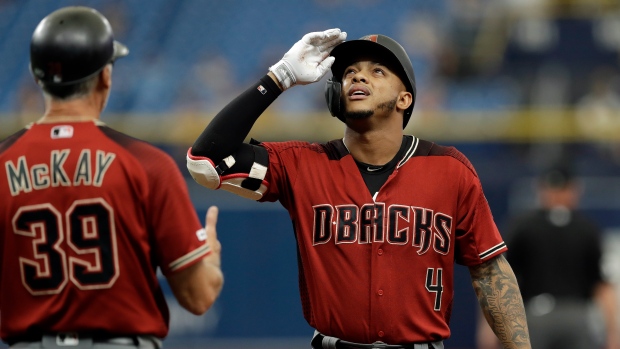 Two late HRs lift D-backs to 2-0 victory over Cardinals