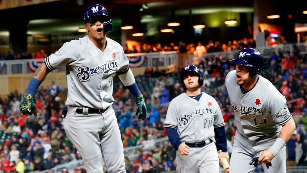 Brewers power up to slow down surging Reds