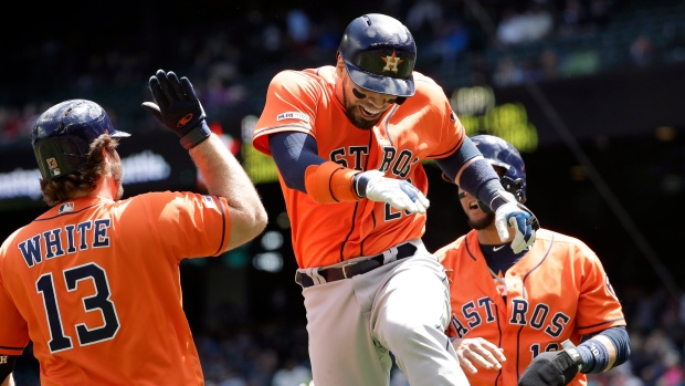 Reddick drives in six as Astros beat O's 