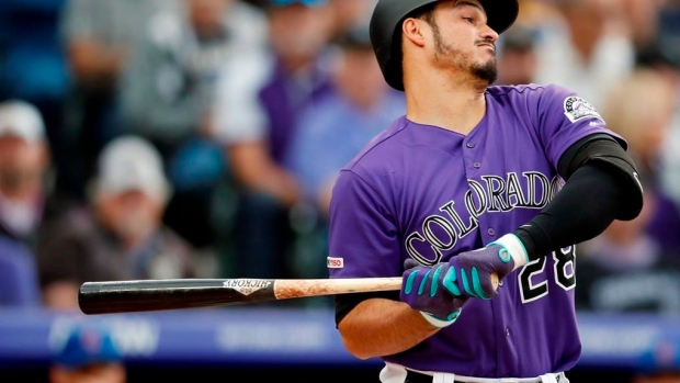 Rockies' Nolan Arenado charges mound after Padres pitcher throws