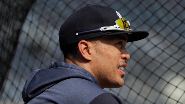 Giancarlo Stanton injures hamstring in painful split for Yankees