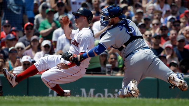 Brock Holt of the Boston Red Sox reacts to advancing to second