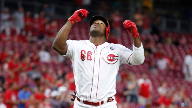 Yasiel Puig homers in 11th, Dodgers beat Reds