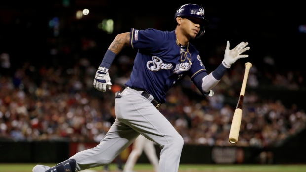 Brewers shortstop Orlando Arcia bolts from game for twins' birth