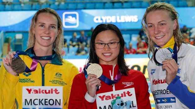 Maggie MacNeil wins gold, sets Canadian record in 100M butterfly