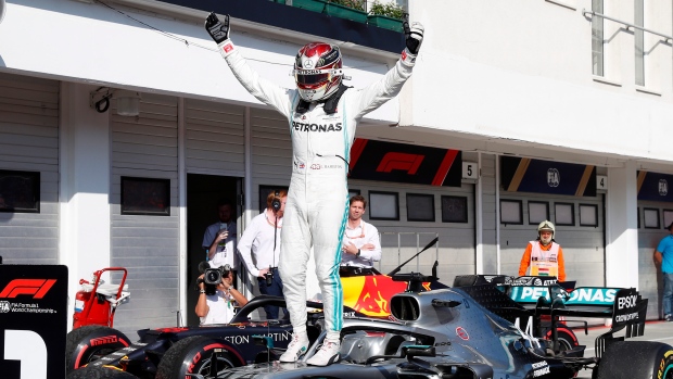 Lewis Hamilton overtakes Max Verstappen late on to win Hungarian GP 