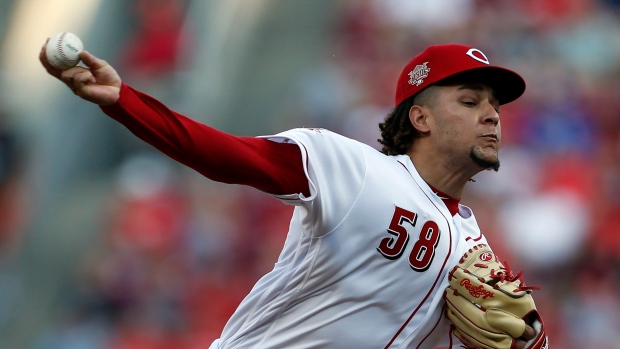 Luis Castillo strong again as Reds beat Braves 4-1