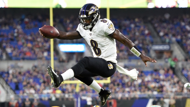 Jackson looks sharp, Rodgers sits as Ravens beat Packers