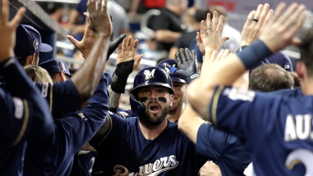 Moustakas hits 2 HRs, Brewers minus Yelich top Marlins 7-5
