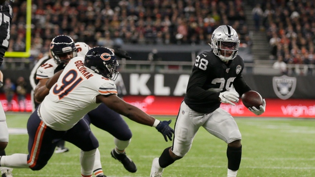 Jacobs, Raiders rally in second half, beat Texans