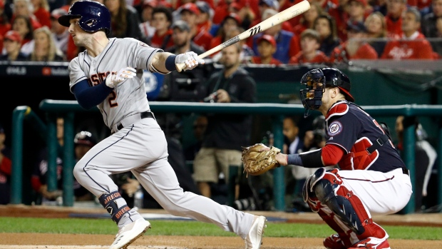 Urquidy, Bregman lead Astros over Nationals 8-1 to tie Series 2-2