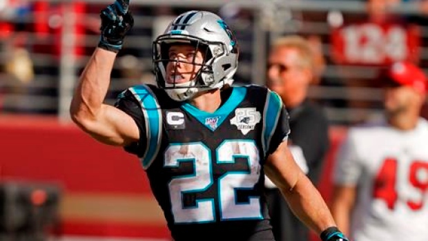 McCaffrey scores 3 TDs as Panthers defeat Titans 30-20