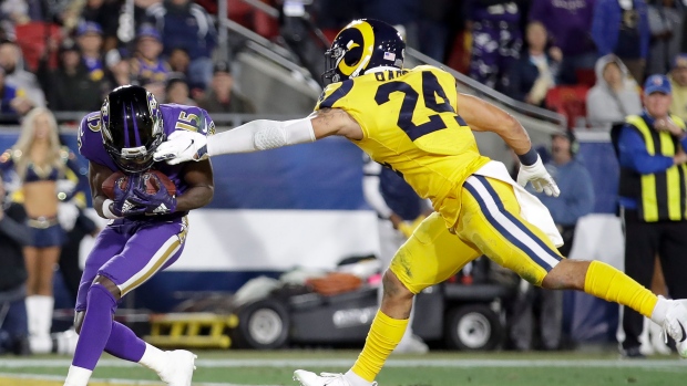 Los Angeles Rams safety Taylor Rapp (24) and Atlanta Falcons place