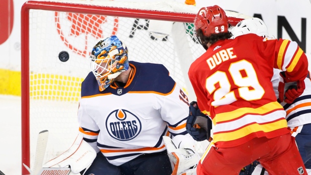 Flames grab early lead; edge Sabres 4-3