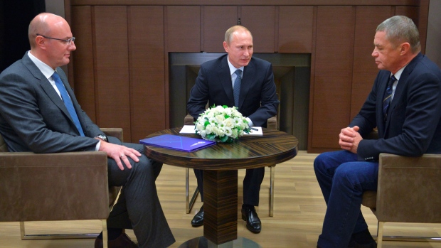 Vladimir Putin, Alexander Medvede and Dmitry Chernyshenko