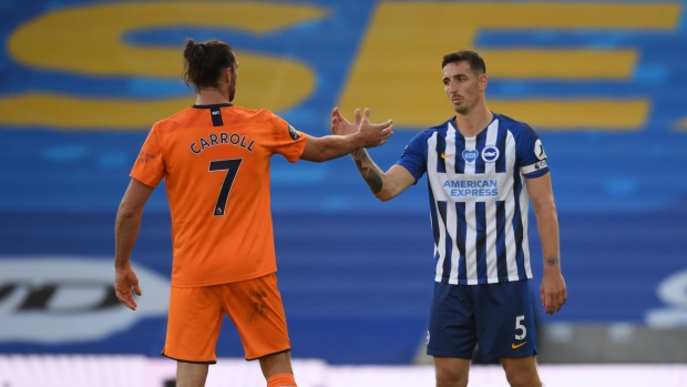 Newcastle's Andy Carroll and Brighton's Lewis Dunk