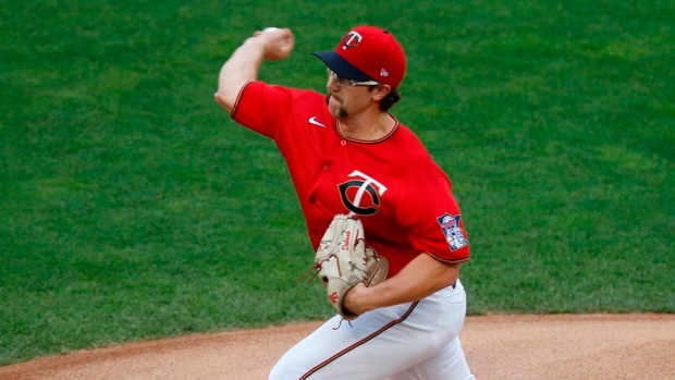 Minnesota Twins starting pitcher Randy Dobnak throws a pitch to