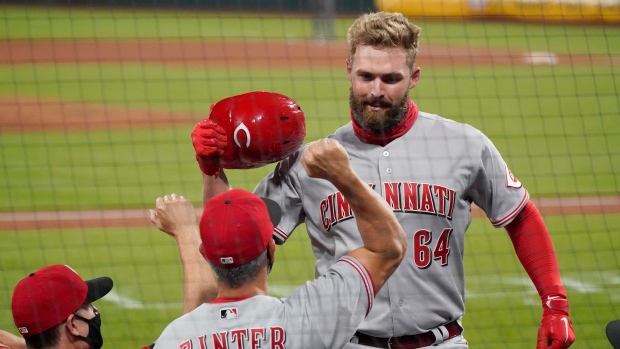 Suarez hits HR No. 40 but Cardinals beat Reds with another walk-off hit