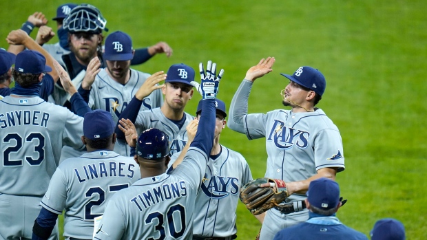 Meadows, Rays split with Yankees in 7-inning doubleheader