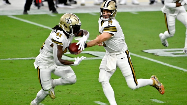 Kamara's 6 TDs tie NFL record; Saints beat Vikings 52-33