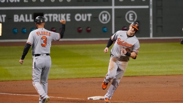 Pat Valaika of the Baltimore Orioles reacts after striking out