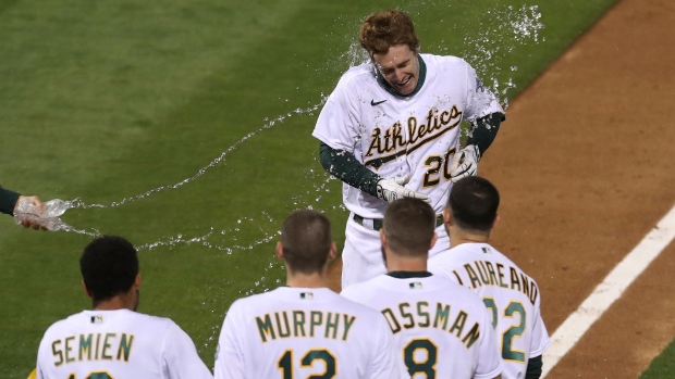 Mark Canha's pinch-hit home run lifts A's past Giants 4-3