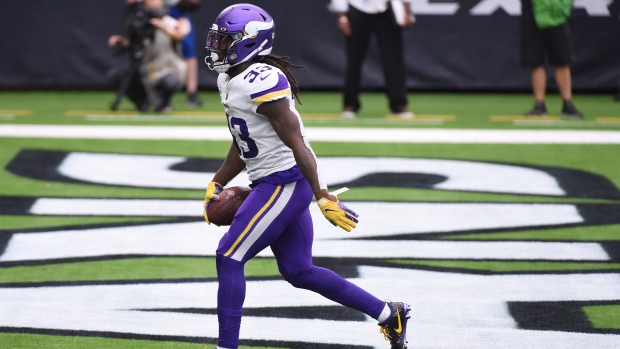 Cook has 2 TDs as Vikings get 1st win, 31-23 over Texans