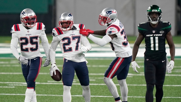 New England Patriots cornerback J.C. Jackson (27) celebrates his