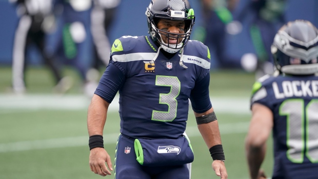 NFC quarterback Russell Wilson of the Seattle Seahawks (3) throws