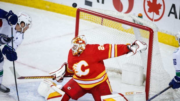 Dube scores in OT as Flames spoil Gaudreau's return to Calgary